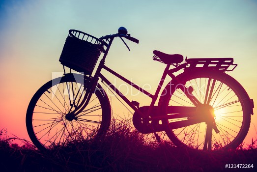 Picture of Landscape picture Vintage Bicycle with Summer grass field at sun